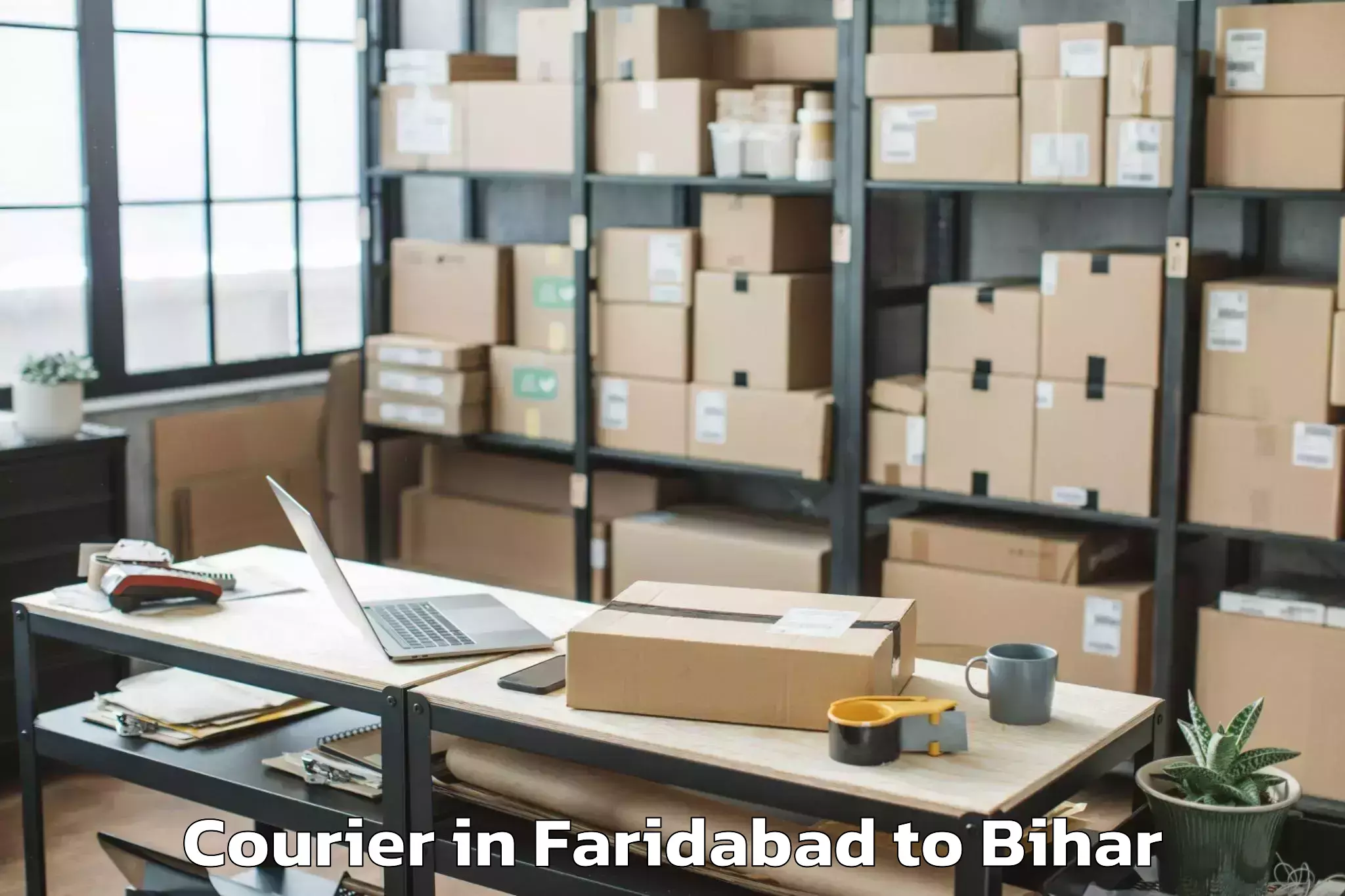 Book Faridabad to Taraiya Courier Online